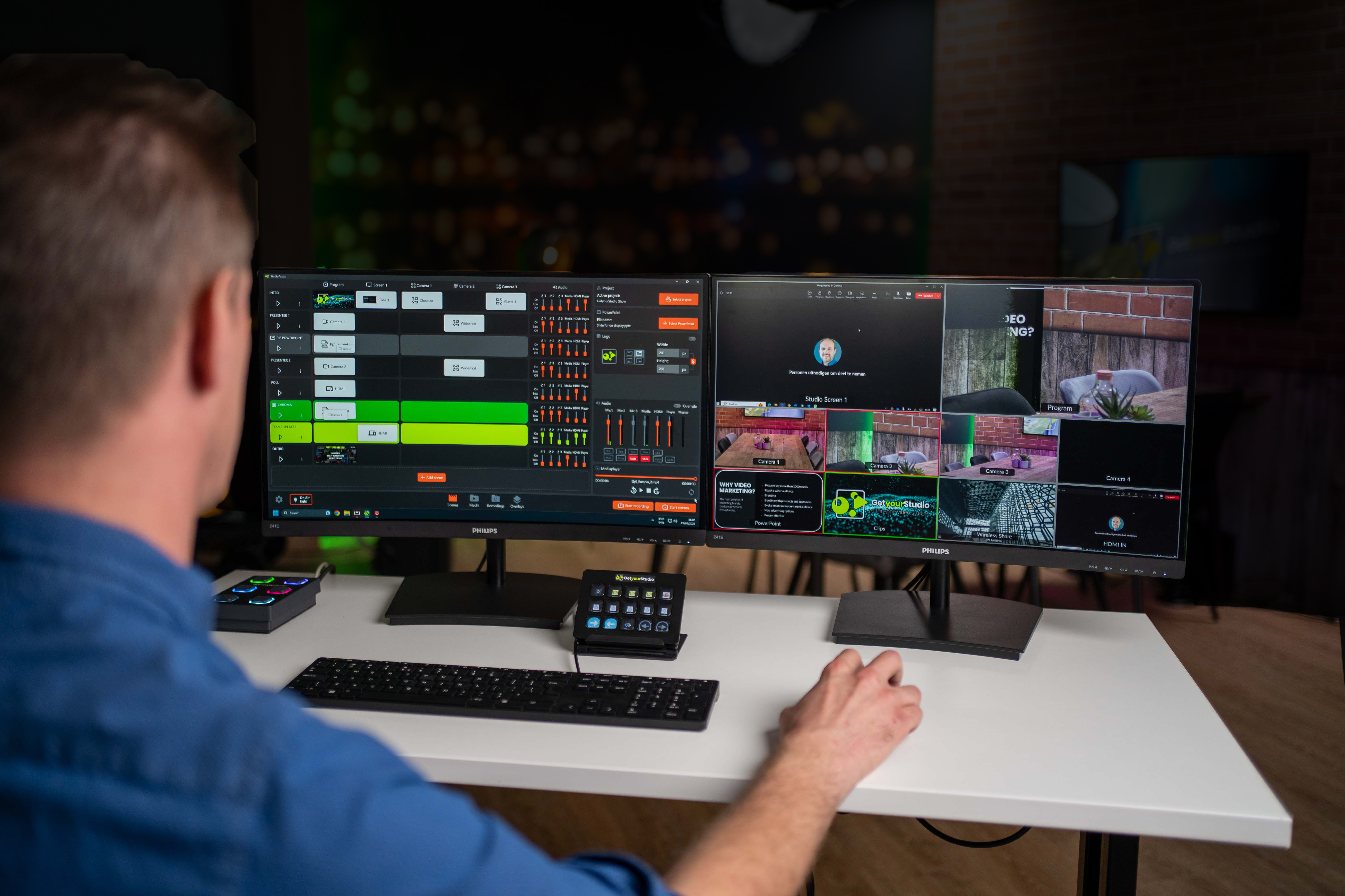 GetyourStudio operator in studio with interface on monitor